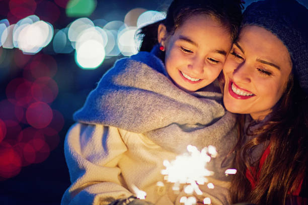 istock Mother is hugging her daughter at Christmas 872914774