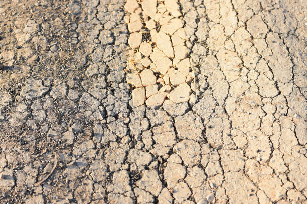 istock Paved road Caused by rain and flood. 872915812