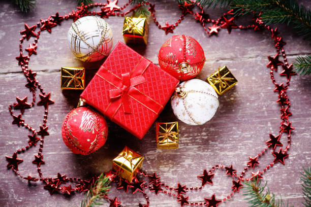 istock Christmas balls, gift boxes, bijouterie and fir tree branch 872919702