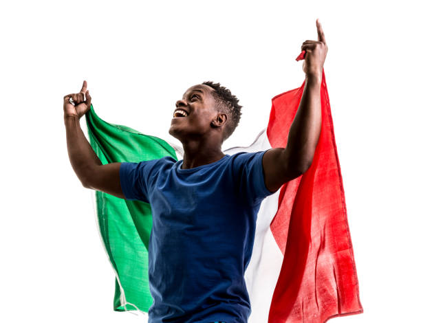 istock Italian afro fan holding the national flag 872923452