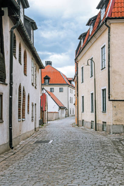 istock road with old buildings in visby sweden 872926786