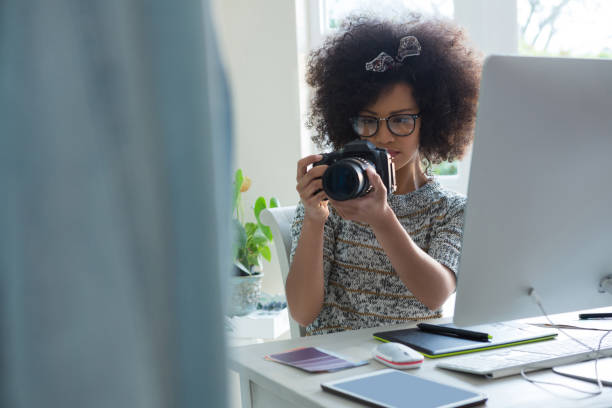 istock Graphic designer taking picture with digital camera 872927150