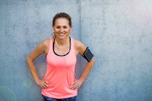 istock Woman running in urban area 872930738