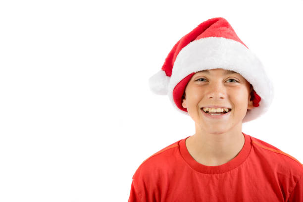 adolescente felice che indossa un cappello di natale - 12 15 months foto e immagini stock