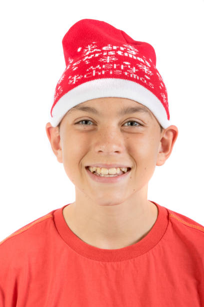 adolescente felice che indossa un cappello di natale - 12 15 months foto e immagini stock