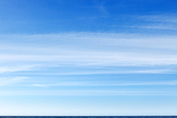 istock beautiful blue sky with white Cirrus clouds 872934410