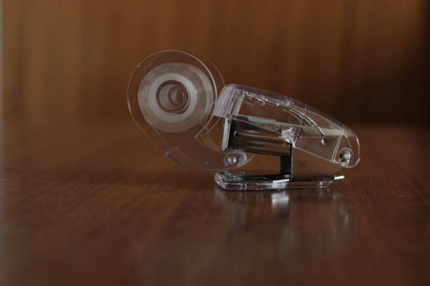 istock Pocket set of one paper stapler and scotch tape 872936344