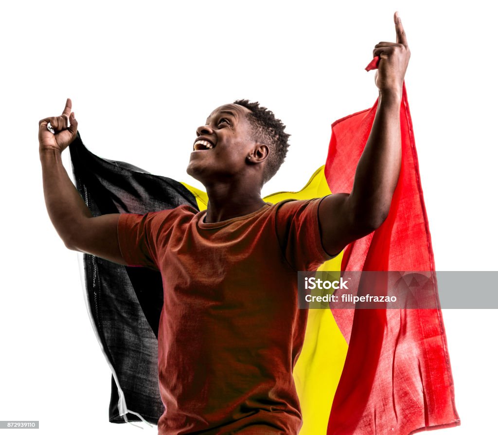 Belgian afro fan holding the national flag Sport collection Belgium Stock Photo
