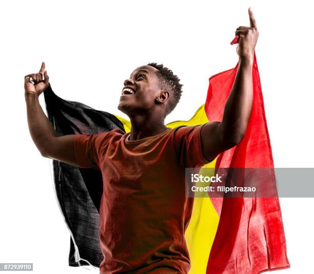 Belgian Afro Fan Holding The National Flag Stock Photo - Download Image Now - Belgium, Soccer, Fan - Enthusiast