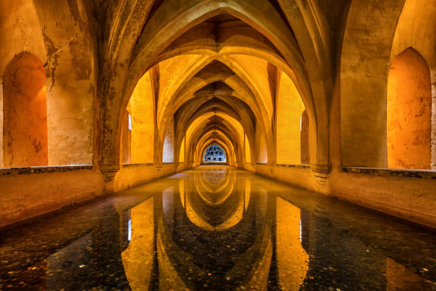 Underground Baths at Royal Alcazar in Seville, Spain Seville, Spain - October 10, 2017: Baths of Dona Maria Padilla at the Royal Alcazar in Seville, Andalusia, Spain. el alcazar palace seville stock pictures, royalty-free photos & images