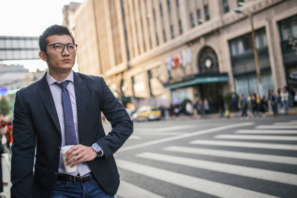 istock Young businessman in city 872949532