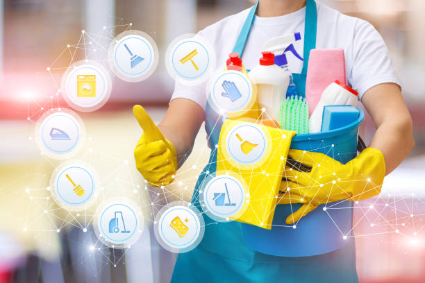 istock Cleaning lady shows on screen quality services . 872950230
