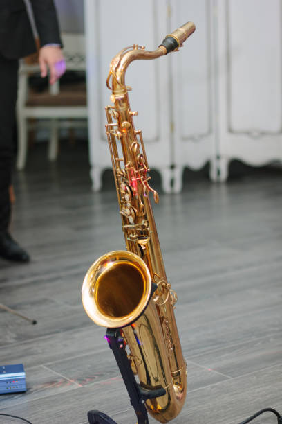 istock Saxophone staying on the rack at the scene. 872952998