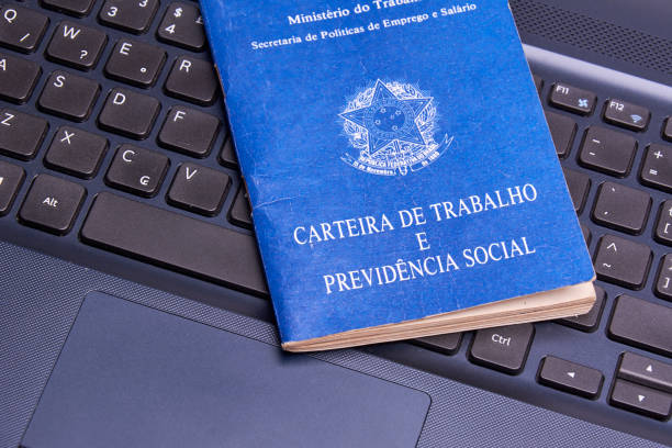 istock Brazilian social security document over the laptop keyboard 872953136