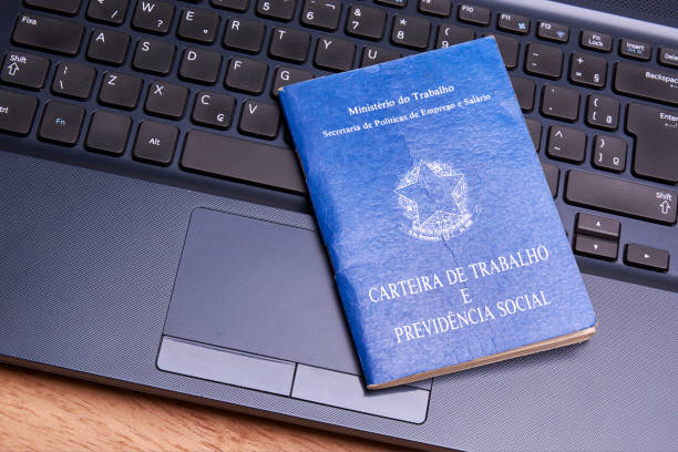 istock Brazilian social security document over the laptop keyboard 872953144