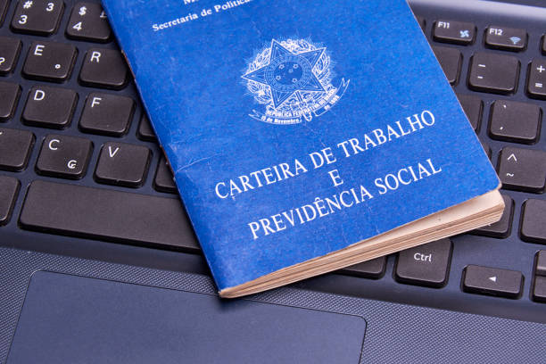 istock Brazilian social security document over the laptop keyboard 872953210