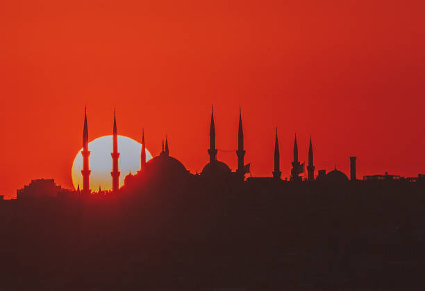 Sunset with sun behind silhouette in Istanbul,Turkey