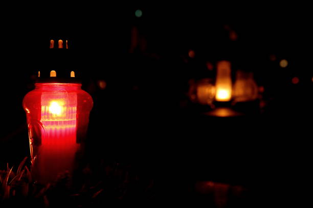istock Burning candles in memory of people who died. 872965920