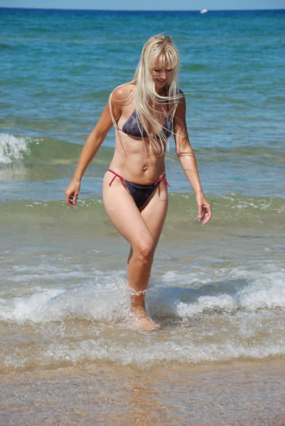 istock woman at beach 872975804
