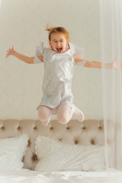 istock Little Girl and clock 872980524