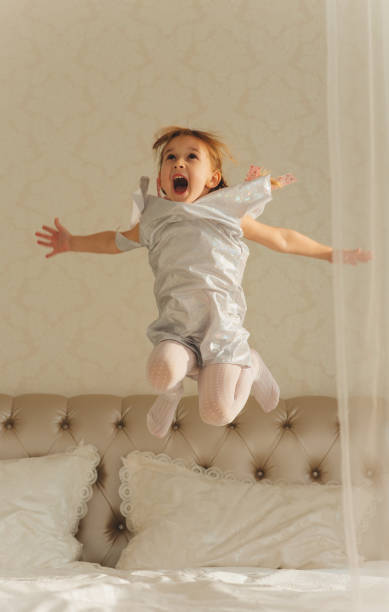 istock Little Girl and clock 872980580