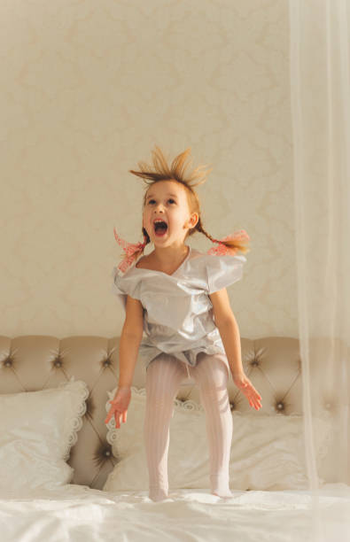 istock Little Girl and clock 872980590