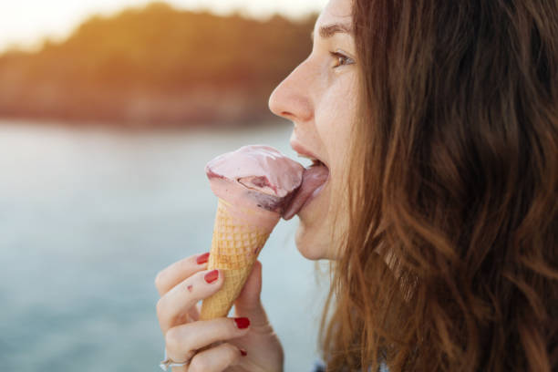 istock Woman with ice cream 872984286