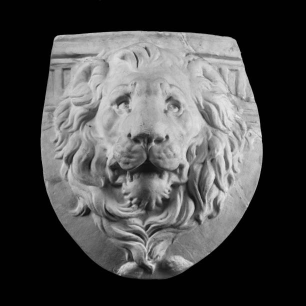 coat plaster with moldings in the form of the muzzle of a lion