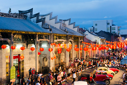 Georgetown, Penang: Crowded street scene of locals and tourists celebrating the Chinese New Year and The Year of the Rooster in Georgetown, Penang, Malaysia. The Chinese New Year street party in as annual event in the UNESCO World Heritage Site of Georgetown.