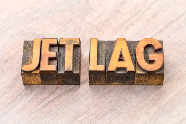 Photo of jet lag word abstract in wood type