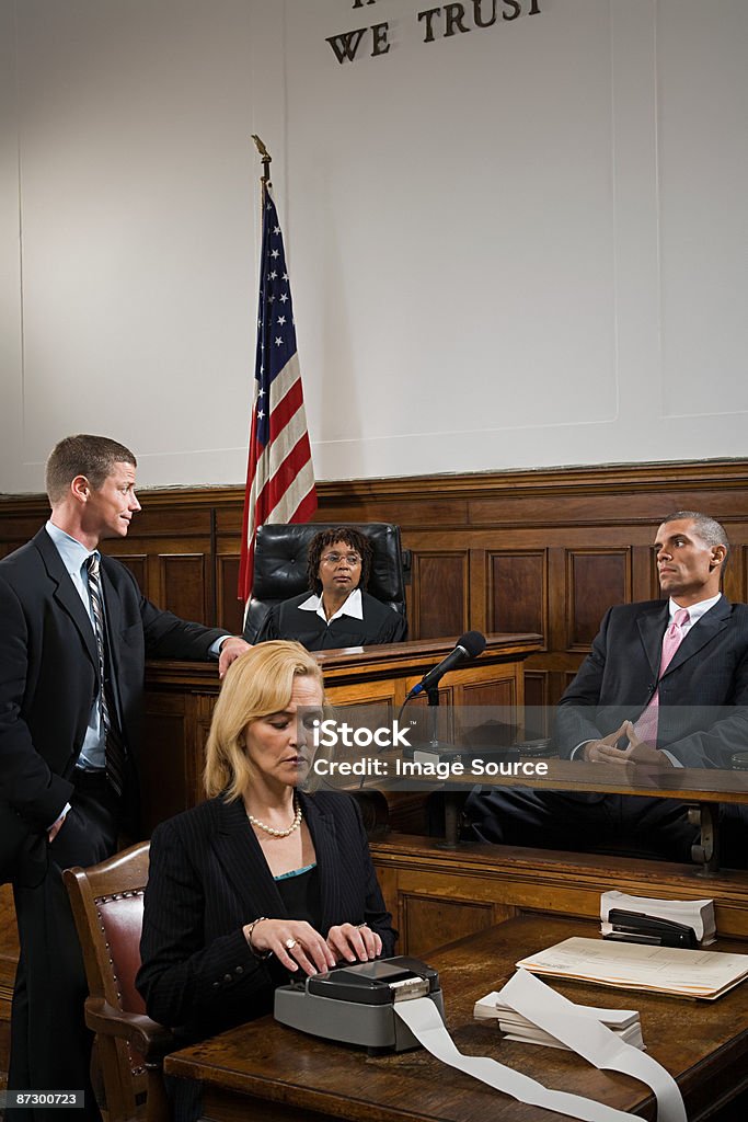 A lawyer questioning a suspect  Stenographer Stock Photo