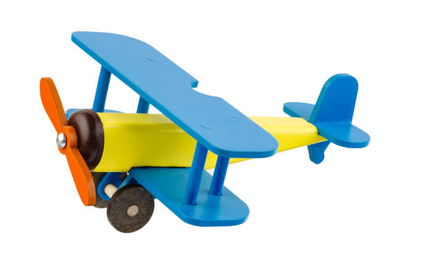 istock Wooden children's colored airplane isolated on white background. 873019410
