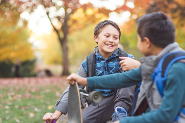 Brothers spending time together at a park after school