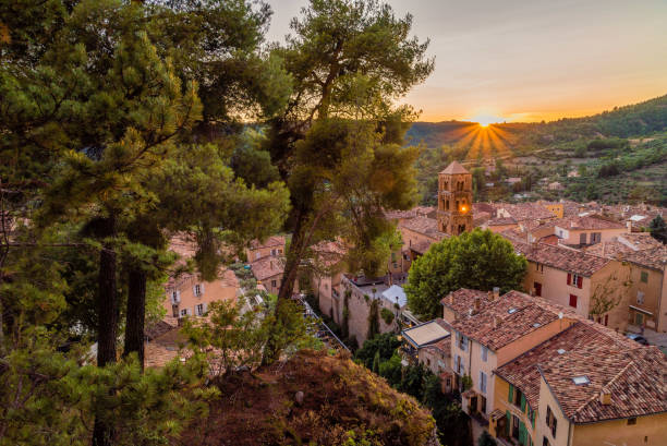 istock Pines and sunset in Moustiers Sainte Marie 873034002
