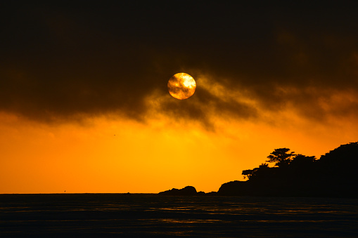 Carmel beach in California with a magnificent sunset.