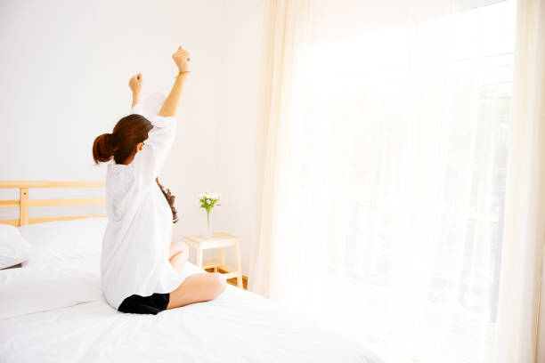 istock Girl wake up early. 873081610