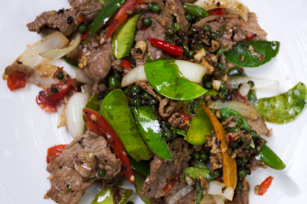 istock Asian Thai oriental food Stir fried black pepper meat beef 873085452