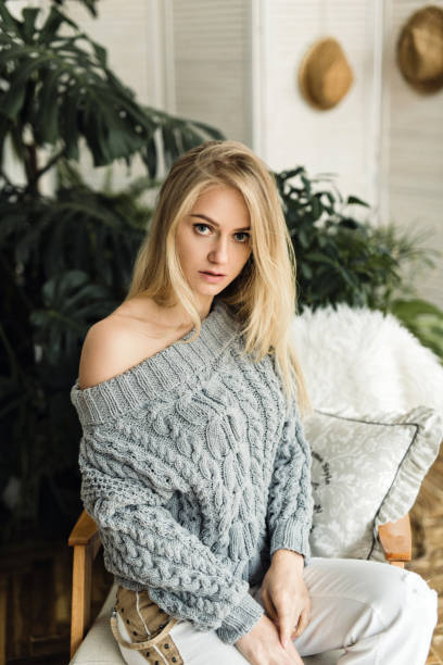 istock woman in a beautiful interior 873087596