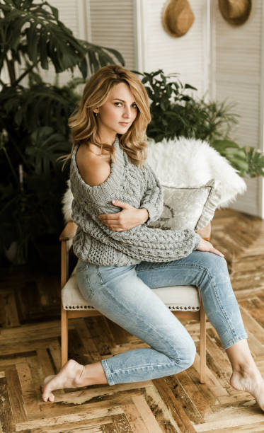 istock woman in a beautiful interior 873088830