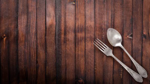 istock Old cutlery. On Wooden background. Top view. 873104078