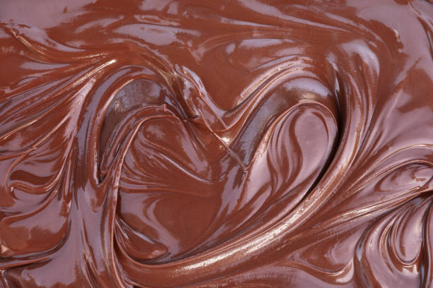 istock heatr shaped melted dark chocolate texture for pattern and background 873105032