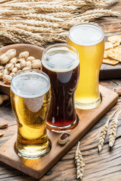 istock Glasses of beer and snacks. 873108280