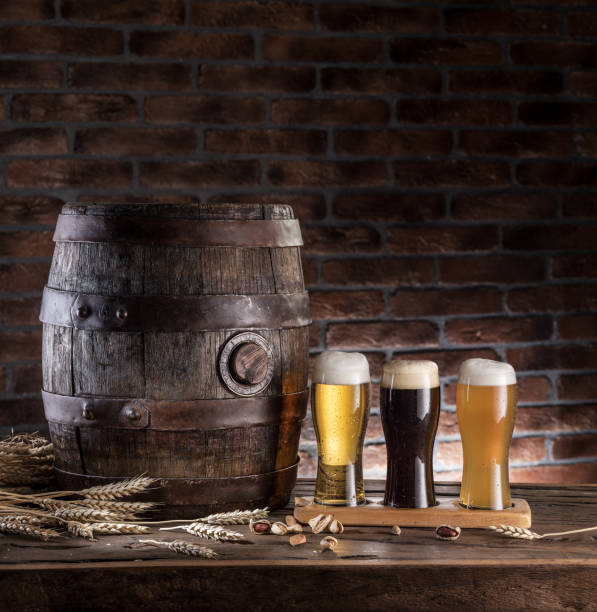 istock Glasses of beer and ale barrel. 873108328