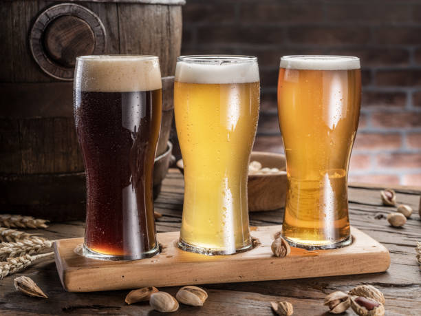 istock Glasses of beer and ale barrel. 873108336
