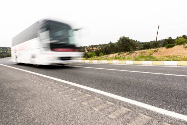 Bus on Highway Bus on Highway bus livery stock pictures, royalty-free photos & images
