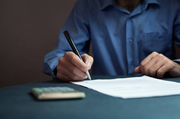 istock Businessman signing contract. 873111810