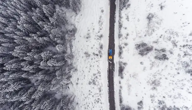 Photo of Aerial view of a snowplow truck on a snowy day