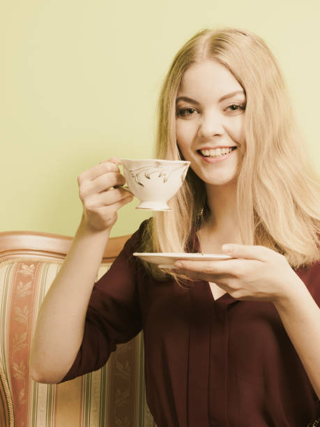 istock Woman drinking hot coffee beverage. Caffeine. 873125592