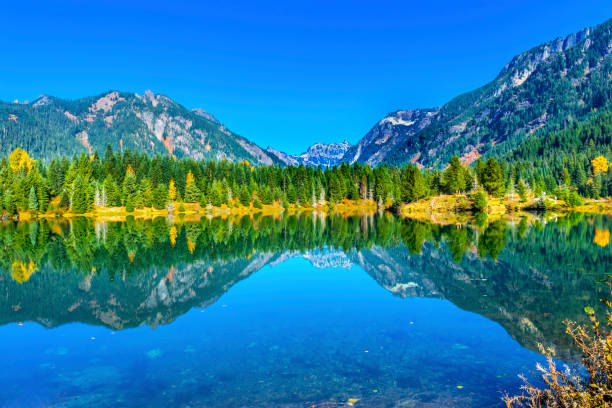istock Gold Lake Reflection Mt Chikamin Peak Snoqualme Pass Washington 873133784
