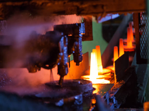 istock automotive part production by hot forging process 873134032